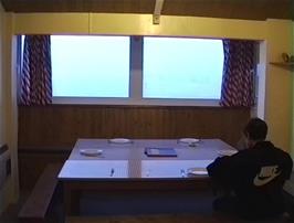 Eliot enjoys fabulous views across Perranporth Beach from the hostel dining room